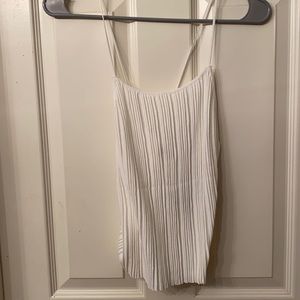 Free People white tank, size medium, brand new.